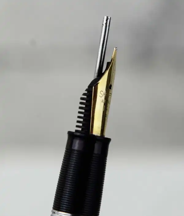 Vintage Sheaffer  snorkel  fountain pen  with 14K solid gold M nib - Image 9